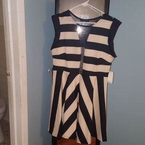 cream and black mesh low cut dress.